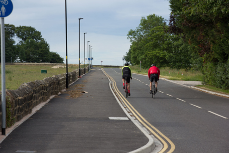 Cyclists ignoring the shared use pavement on Beckwith Head Road