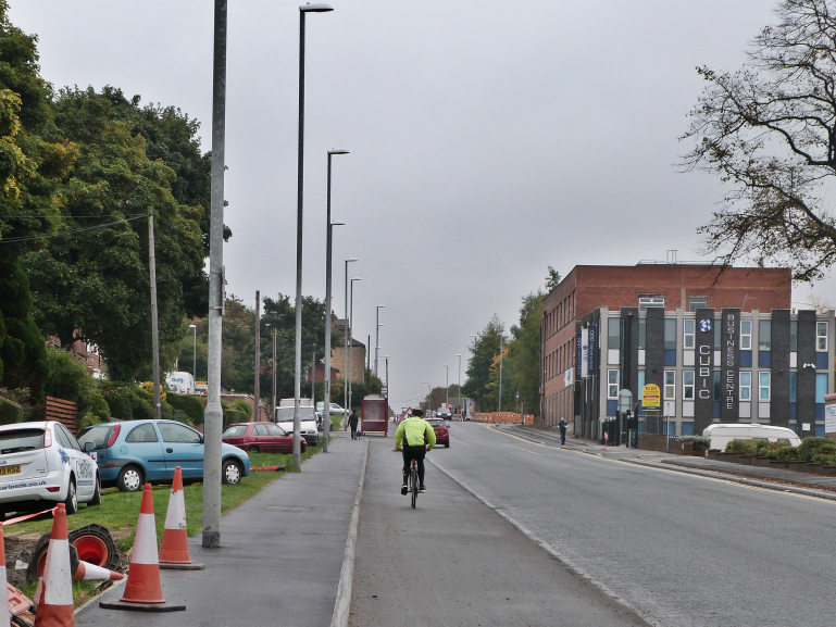 Cyclist on Leeds Bradford Cycle Superhighway, Stanningley