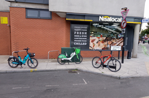 Bikes parked outside Nisa local supermarket