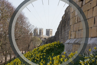 York City Walls and Minster seen through a bike wheel