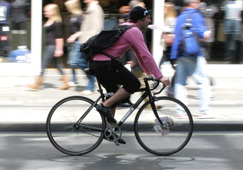 Motorist Aggression is Top Barrier to Cycling Bike courier, by ProfDEH, Licence CC BY-SA 3.0