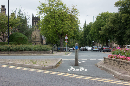 Cycle facility enabling riders to go straight across Station Parade