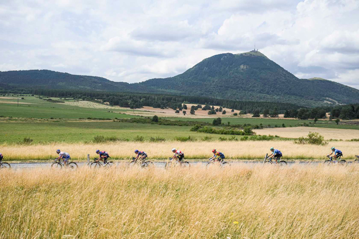 Riders passing the Puy de Dome on Stage 10 TDF 2025, by A.S.O./Charly Lopez