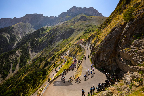 Different Hill Same Result on Stage 19 Hairpin bend on Alpe d'Huez climb, by ASO/Charly Lopez