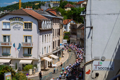 Breakaway Riders Bustle in Ussel on Stage 9 Stage 9 TDF 2026, by ASO/Charly Lopez